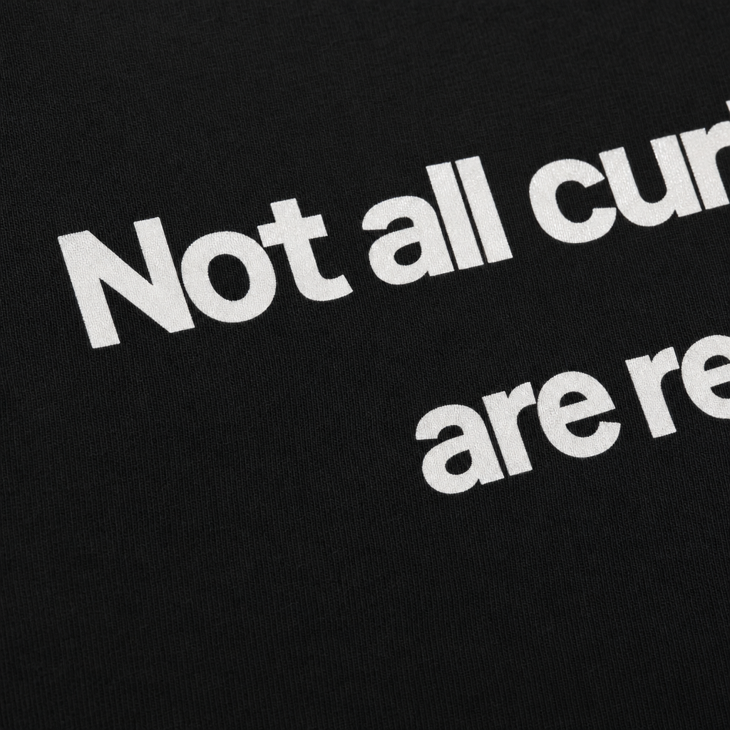 Close-up fabric detail - CURLY HAIR GUY BLACKLIST BLACK T-SHIRT