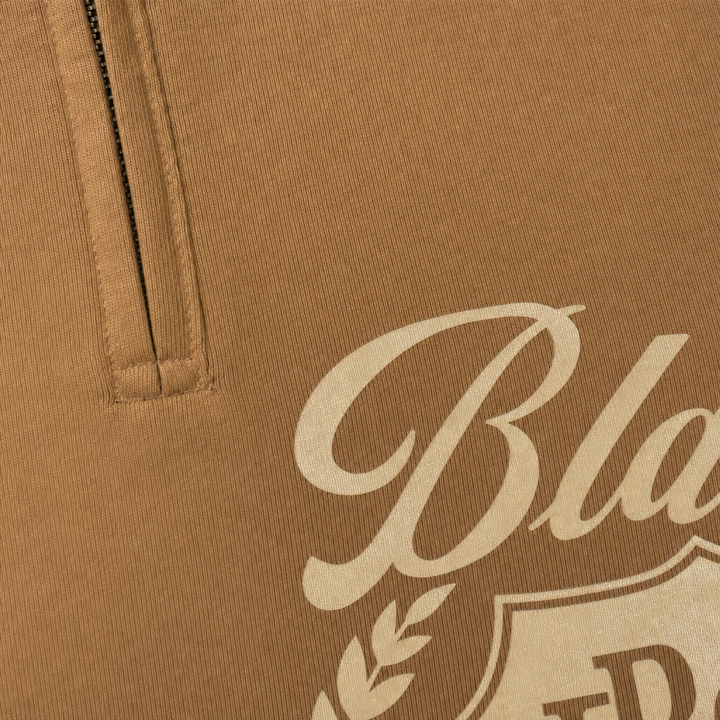 Close-up fabric detail - Blacklist Club Sand Oversized Quarter Zip T-Shirt