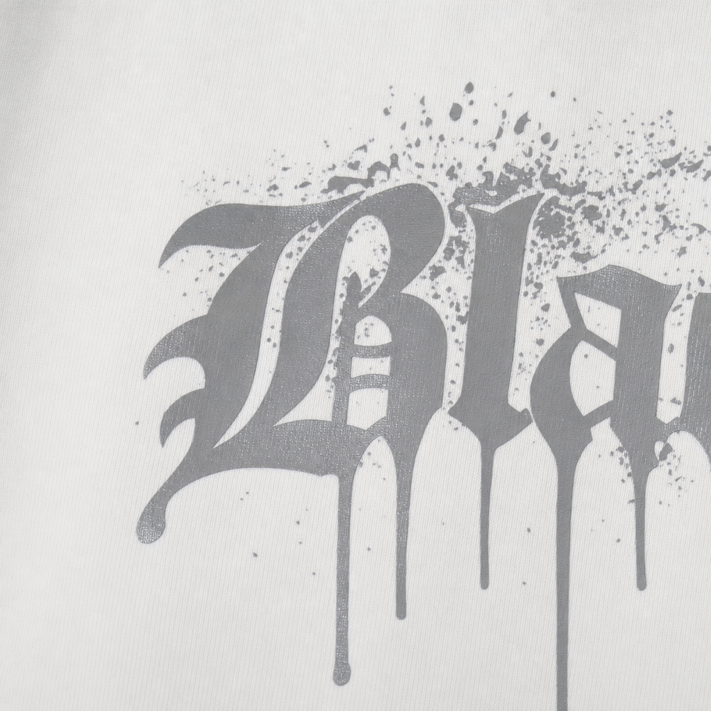 Close-up fabric detail - Blacklist Drip White 2.0 Black T-shirt