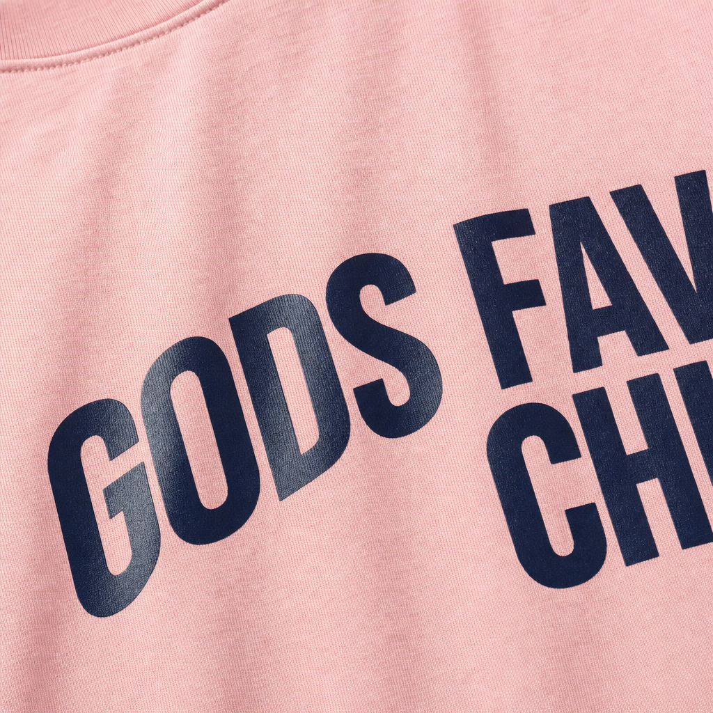 Close-up fabric detail - Gods Favourite Child Pink T-shirt