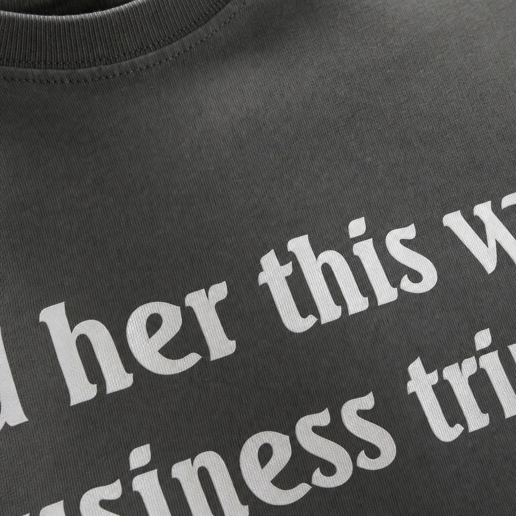 Close-up fabric detail - TOLD HER THIS WAS A BUSINESS TRIP GRAY T-SHIRT