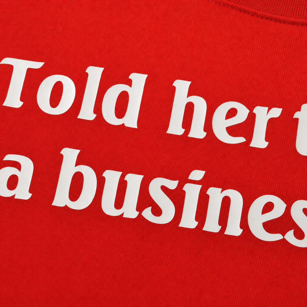 Close-up fabric detail - TOLD HER THIS WAS A BUSINESS TRIP RED T-SHIRT
