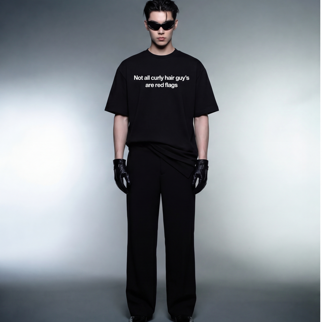 curly-hair-guy-blacklist-blck-t-shirt model front
